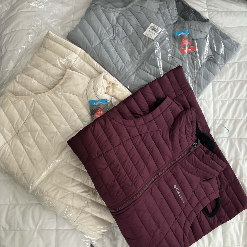 Women’s set of three Columbia long Vests brand new with tags